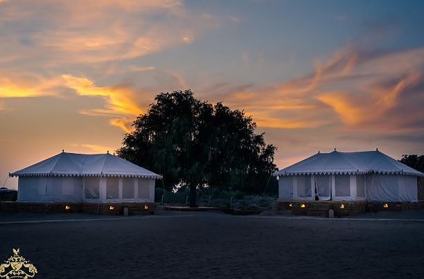 Jadam Resort heritage desert camp in Jaisalmer at sunset - luxury tents in Thar desert